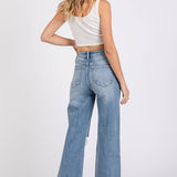 ON THE TOWN HIGH RISE STRETCH SLIM WIDE LEG W/ DESTROYED HEM